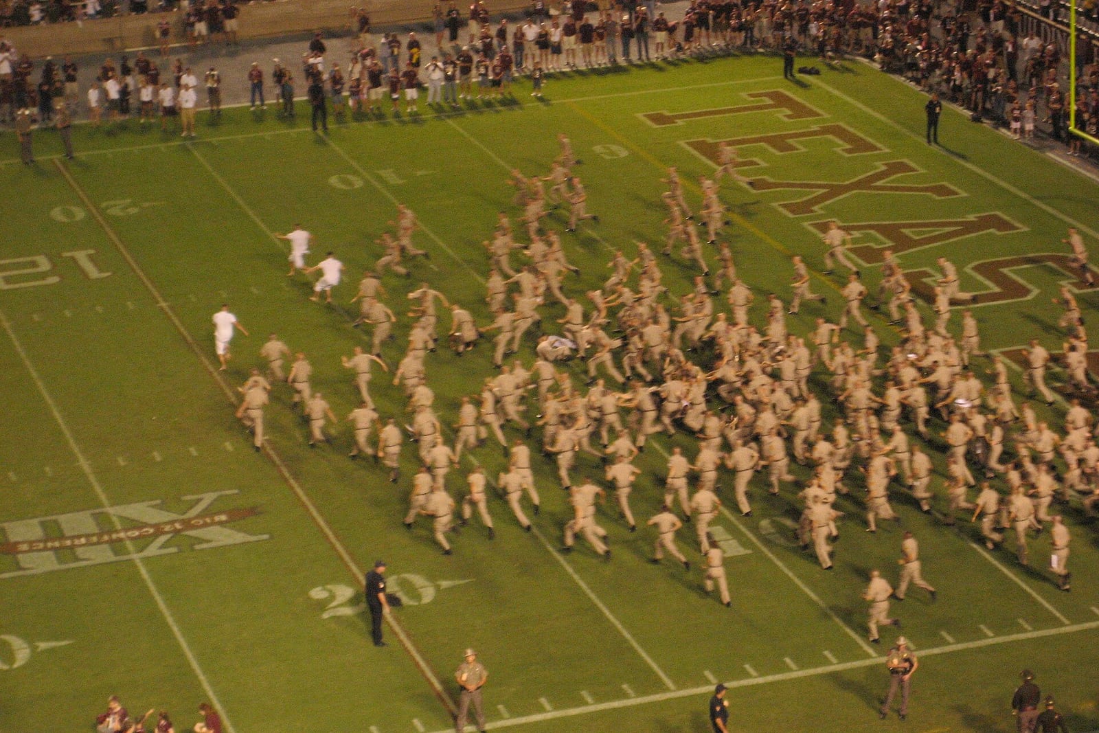 The Corps of Cadets rushing the field at Kyle Field